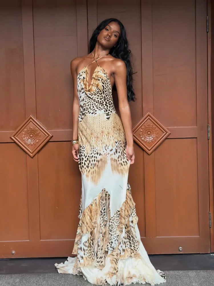 Vestido largo maxi para mujer con estampado de leopardo, escote halter pronunciado, falda escalonada con volantes y falda sirena. Elegante vestido de fiesta, cóctel o para uso diario.